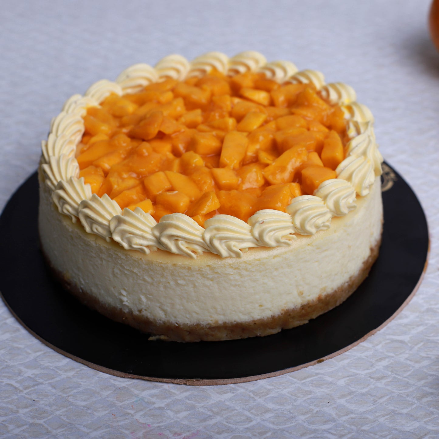 NEW YORK BAKED MANGO CHEESECAKE